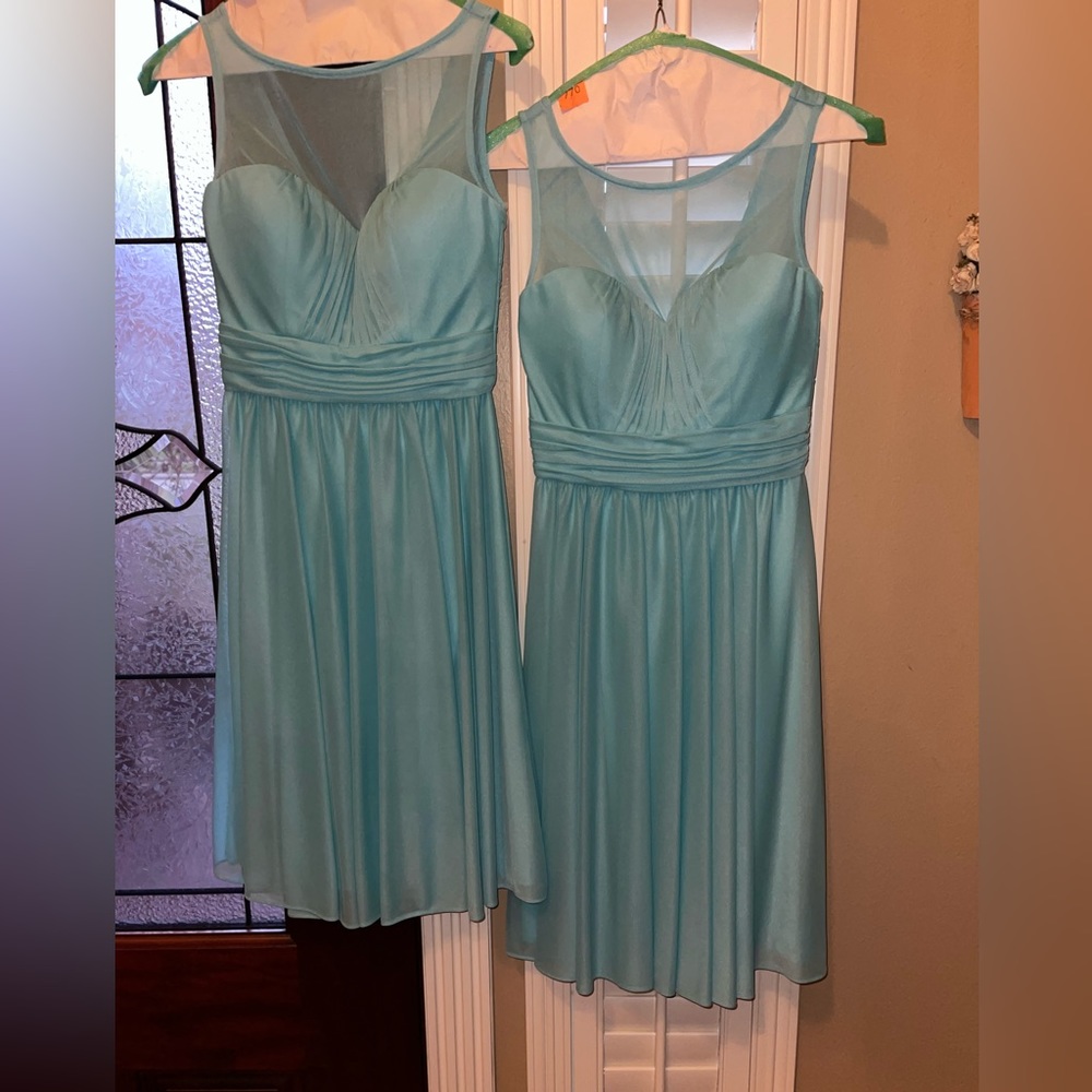 Two bridesmaid/cocktail dresses.